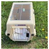 Pet carrier, bed, water bowl, brush