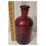 Red Pyrex bottle with stopper