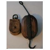 2 Wooden pulleys.