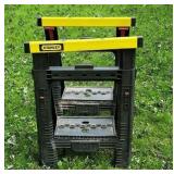 Pair plastic saw horses.