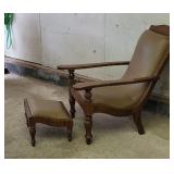 Mid century chair with stool. Neat look to it!