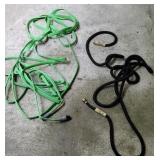 Pair of collapsible hoses.