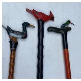 3 canes with birds