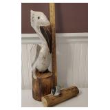 2 carved wooden birds