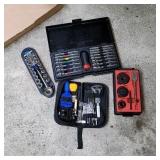 Hole saw kit, screwdriver set, park tool.