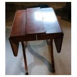Claw foot drop leaf table and 1 leaf.