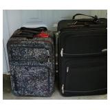 Clean pair suitcases.