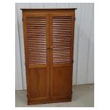 Shutter door cupboard. 60"Tx29"Wx17"D.