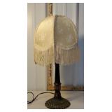 Table lamp with fringe shade