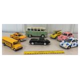 Box of toy buses, cars, etc