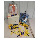 White cube with two costumes and Nerf guns