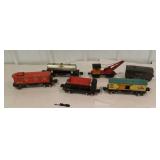 Box of miscellaneous old tin trains