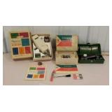 Box lot of Singer sewing machine attachments