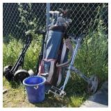 3 golf carts, mixed set of clubs, bucket of