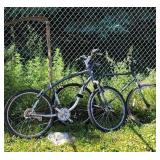 2 bikes, and scythe.