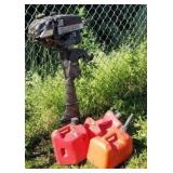 Swedish boat motor and 3 gas cans.