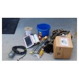 Lot of string, tent stakes,cable clamps  atv