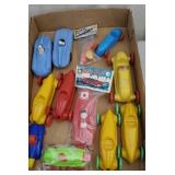 Box of race cars & boat incl original packaging