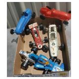 Full box of toy race cars