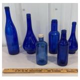 6 blue bottles