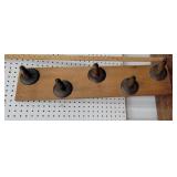 Hog scraper coat rack