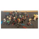 Box of Star Wars figures and vehicle