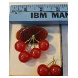Bakelite cherry brooch - two of the cherries are