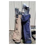 2 golf bags and clubs