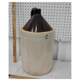 5 gallon brown and white jug
