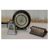 table lighter, barometer, and desk calendar