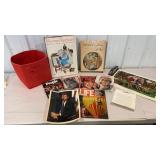 Red tote of books and magazines - Norman