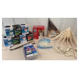 Clear tub of outdoor red and green flood lights,