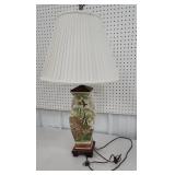 Lamp with peacock and elephant handles