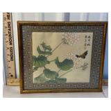 Framed oriental woodblock with flowers and