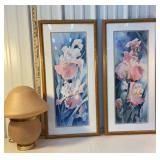 2 floral prints and a lamp