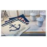 3 white canisters and 4 pillow shams