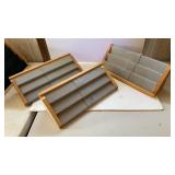 3 gray jewelry displays