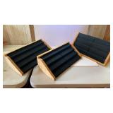 3 black jewelry displays