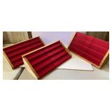 3 red jewelry displays