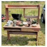 Potting shed table with pots, etc.