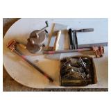 Clamps, grinder, trowel.