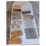 Lot of NY license plates.