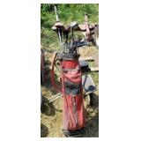 Golf clubs and cart.