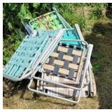 6 aluminum lawn chairs.