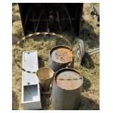 Tin trash cans, planter and shelf.