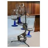 Wine glasses on wire display holder