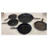 5 piece cast iron - not signed