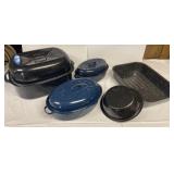 Enamel roasting pans and a strainer