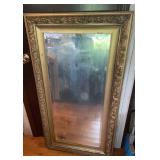 Beautiful gold framed mirror with heavily aged