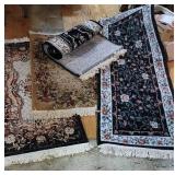 4 Oriental type throw rugs - need cleaning